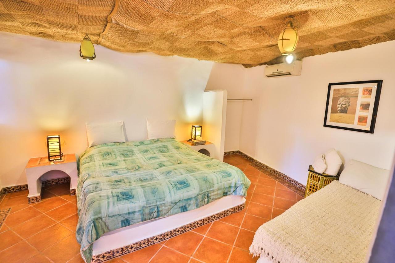Riad Haj Palace & Spa Fez Exterior photo A bedroom in a cave hotel in Cappadocia, Turkey